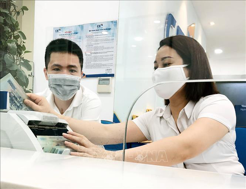 Hoạt động nghiệp vụ tại Ngân hàng Xây dựng Việt Nam (CBBank). Ảnh minh họa: Trần Việt/TTXVN