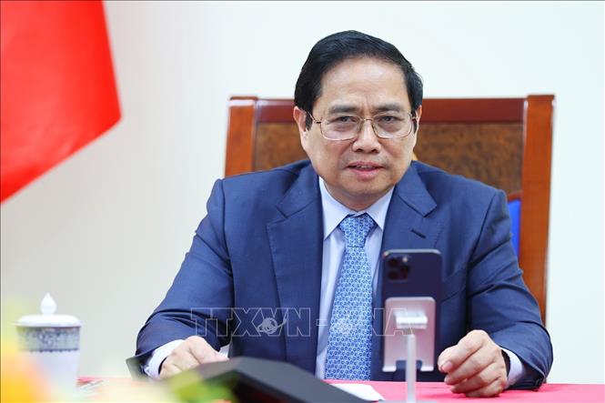 Thủ tướng Phạm Minh Chính điện đàm với Thủ tướng Campuchia Samdech Techo Hun Sen. Ảnh: Dương Giang/TTXVN