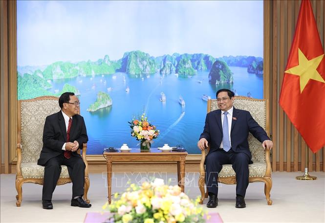Thủ tướng Phạm Minh Chính tiếp đồng chí Khamphan Phommathat, Tổng Thanh tra Nhà nước Lào. Ảnh: Dương Giang/TTXVN
