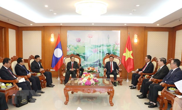 Chủ nhiệm Uỷ ban Kiểm tra Trung ương tiếp Đoàn đại biểu cấp cao Ban Kiểm tra Trung ương Đảng Nhân dân cách mạng Lào. (Ảnh: Phương Hoa/TTXVN)