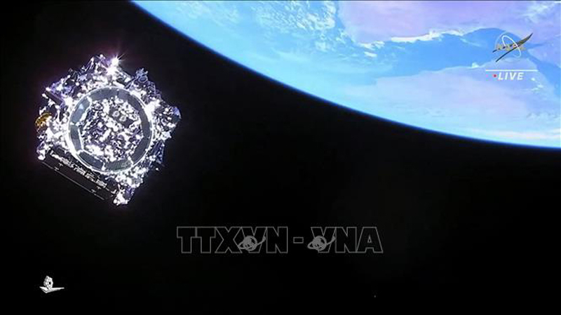 ​ Kính viễn vọng không gian James Webb tách khỏi tên lửa đẩy Ariane 5 sau khi được phóng vào quỹ đạo tại trung tâm vũ trụ Guiana ở Kourou thuộc Pháp, ngày 25/12/2021. Ảnh: AFP/TTXVN