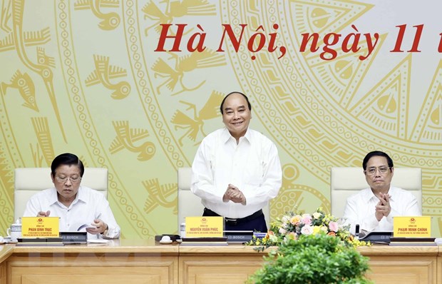 Chủ tịch nước Nguyễn Xuân Phúc làm việc với Ban Cán sự Đảng Chính phủ về Đề án xây dựng Nhà nước pháp quyền. (Ảnh: Thống Nhất/TTXVN)