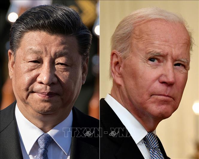 Tổng thống Mỹ Joe Biden (phải) và Chủ tịch Trung Quốc Tập Cận Bình. Ảnh: AFP/TTXVN