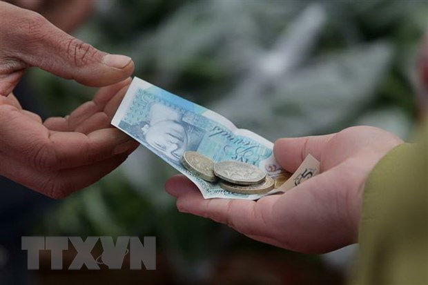 Đồng bảng Anh tại thủ đô London. (Ảnh: AFP/TTXVN)