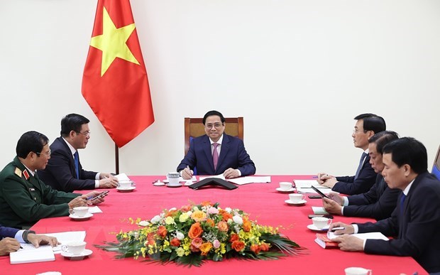 Thủ tướng Phạm Minh Chính điện đàm với Thủ tướng Trung Quốc Lý Khắc Cường. (Ảnh: Dương Giang/TTXVN)