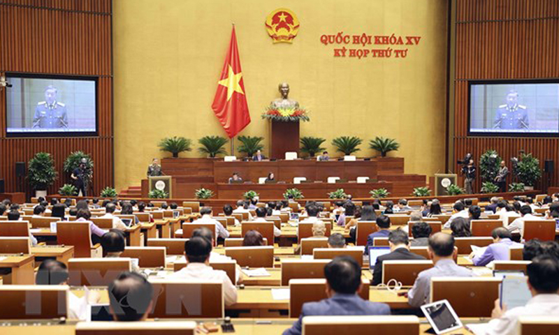 Bộ trưởng Bộ Công an Tô Lâm trình bày Báo cáo công tác phòng, chống tội phạm và vi phạm pháp luật năm 2022. (Ảnh: Doãn Tấn/TTXVN)