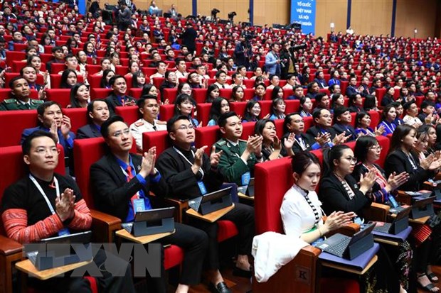 Các đại biêu thể hiện tinh thần, nhiệt huyết của tuổi trẻ tại đại hội. (Ảnh: Minh Đức/TTXVN)