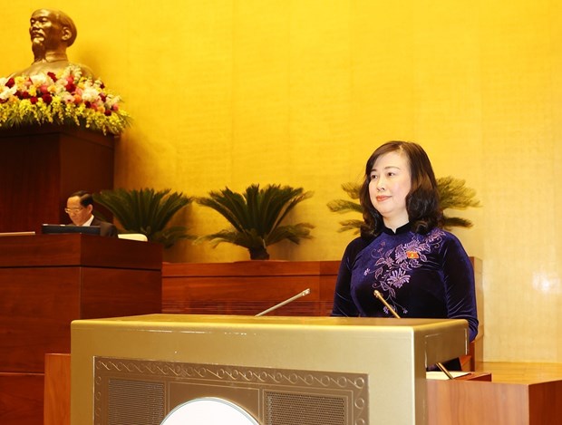 Bộ trưởng Bộ Y tế Đào Hồng Lan Báo cáo kết quả triển khai thực hiện các chính sách phòng, chống dịch bệnh Covid-19 quy định tại Nghị quyết số 30. (Ảnh: TTXVN)