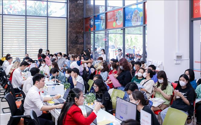 Thí sinh đến nhập học tại trường Đại học Kinh tế Tài chính Thành phố Hồ Chí Minh. Ảnh minh họa: Thu Hoài/TTXVN