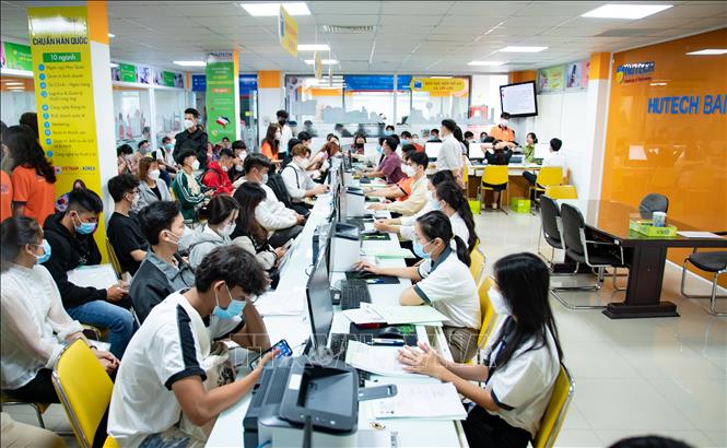 Thí sinh đến nhập học tại trường Đại học Công nghệ TP Hồ Chí Minh (HUTECH). Ảnh tư liẹu: Thu Hoài/TTXVN