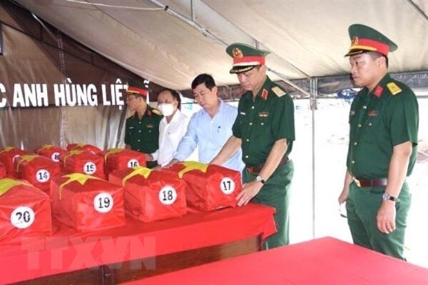 Đội quy tập hài cốt liệt sỹ Bộ Chỉ huy quân sự tỉnh Đồng Nai phát hiện và quy tập được 26 bộ hài cốt liệt sỹ tại ấp Bàu Bông, xã Phước An, huyện Nhơn Trạch, tỉnh Đồng Nai ngày 14/3/2022. (Ảnh: TTXVN pháp)