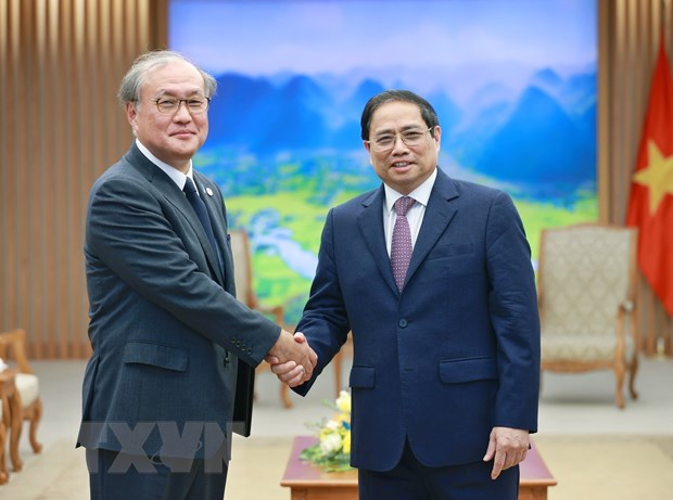 Thủ tướng Phạm Minh Chính tiếp ông Akiba Takeo, Tổng Thư ký Hội đồng An ninh Quốc gia Nhật Bản. (Ảnh: Dương Giang/TTXVN)