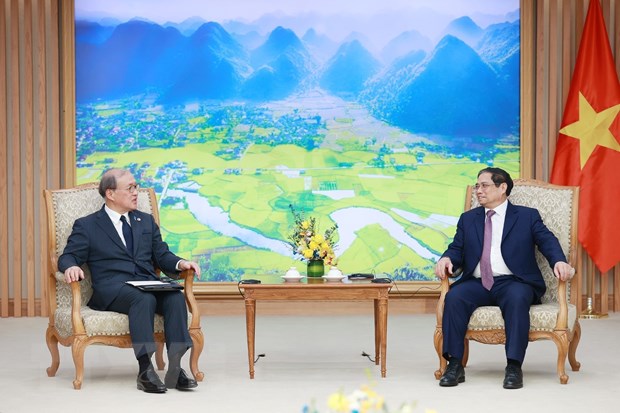 Thủ tướng Phạm Minh Chính tiếp ông Akiba Takeo, Tổng Thư ký Hội đồng An ninh Quốc gia Nhật Bản. (Ảnh: Dương Giang/TTXVN)