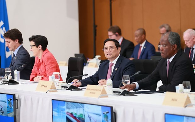 Thủ tướng Phạm Minh Chính tham dự Phiên thảo luận 'Đối tác về cơ sở hạ tầng và đầu tư toàn cầu của G.' (Ảnh: Dương Giang/TTXVN)