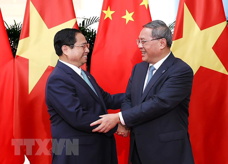 Thủ tướng Phạm Minh Chính vàThủ tướng Trung Quốc Lý Cường. (Ảnh: Dương Giang/TTXVN)