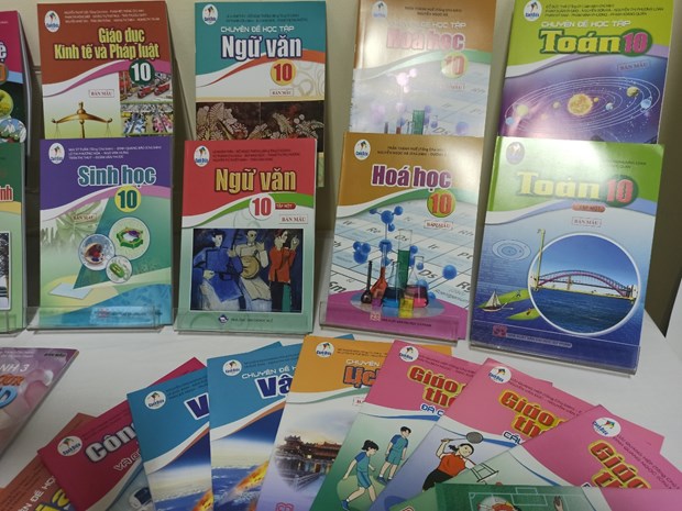 Sách giáo khoa theo chương trình giáo dục phổ thông mới. (Ảnh: PV/Vietnam+)