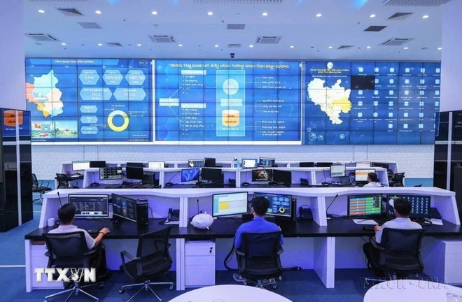 Chính phủ đặt mục tiêu đến năm 2030, Việt Nam sẽ có ít nhất 5 dự án lớn về trí tuệ nhân tạo, công nghệ bán dẫn, nhà máy thông minh và đô thị thông minh. Ảnh: Hoàng Hiếu/TTXVN)