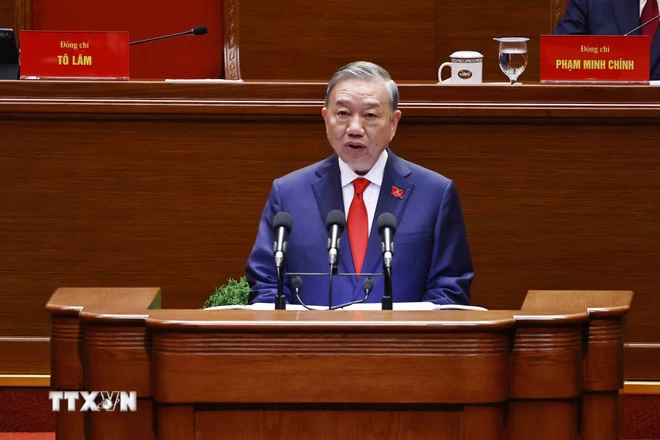 Tổng Bí thư Tô Lâm trình bày Báo cáo của Ban Chấp hành Trung ương Đảng khóa XIII về các văn kiện trình Đại hội XIV của Đảng. (Ảnh: TTXVN)