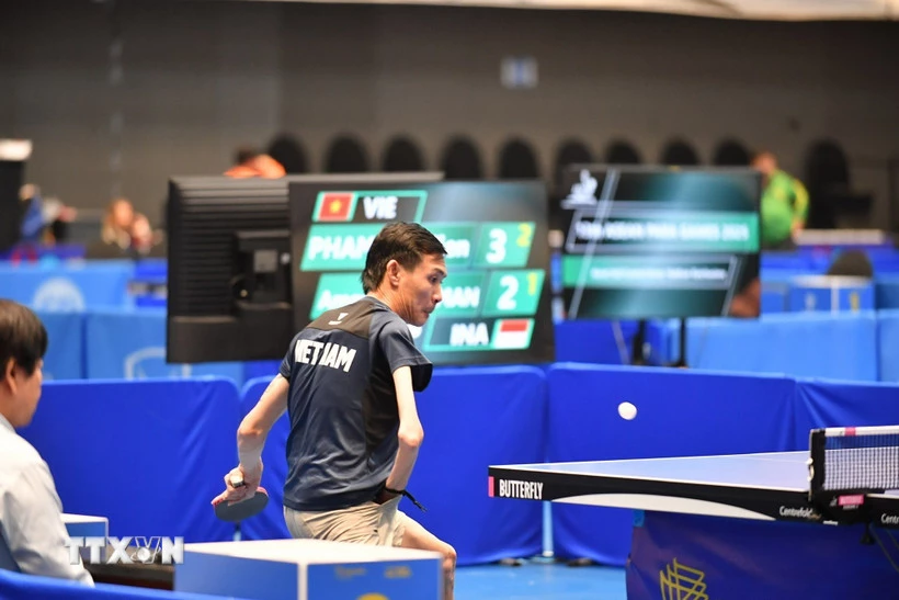 Vận động viên Phạm Thế Tiến giành chiến thắng 3-1 trước đối thủ Indonesia ở bán kết bóng bàn đơn nam để vào tranh chung kết ngày 23/1. (Nguồn: TTXVN phát)