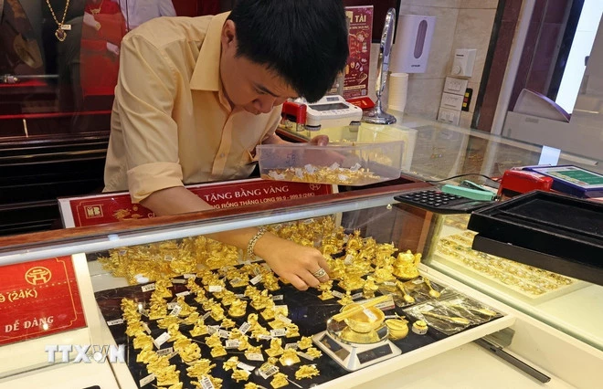 Vàng bày bán tại công ty vàng Bảo Tín Minh Châu. (Ảnh: Trần Việt/TTXVN)