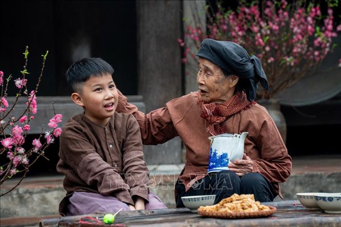 Niềm vui ngày Tết. Ảnh: Khánh Hoà/TTXVN