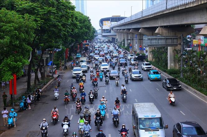 Phương tiện lưu thông tại Ngã Tư Sở, Hà Nội. Ảnh minh họa: Tuấn Anh/TTXVN