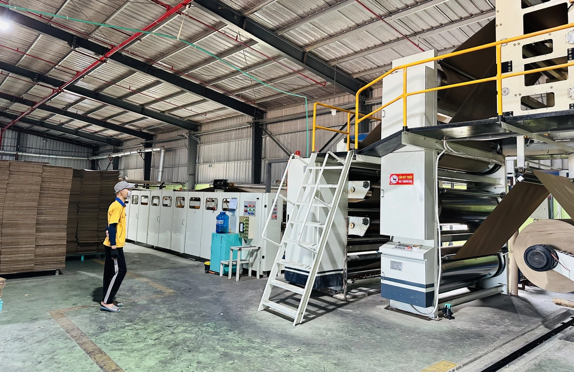 Các doanh nghiệp đẩy mạnh sản xuất, duy trì mức độ tăng trưởng-Ảnh T.A