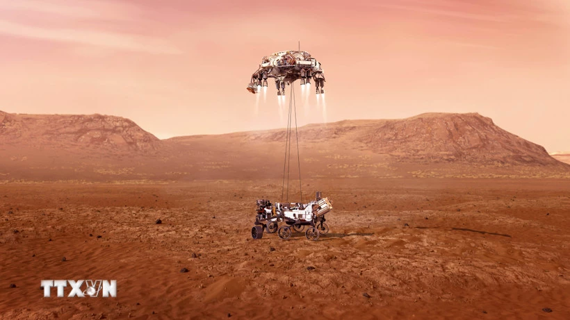 Tàu thám hiểm Perseverance của NASA hạ cánh xuống sao Hỏa. (Ảnh: THX/TTXVN)