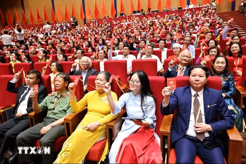 Các đại biểu biểu quyết Thông qua Đề án nhân sự Ủy ban Trung ương Mặt trận Tổ quốc Việt Nam khóa XI, nhiệm kỳ 2026-2031. (Ảnh: Minh Đức/TTXVN)