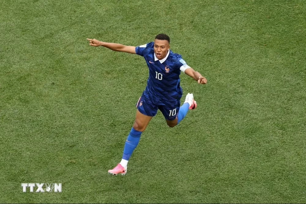 Mbappe tỏa sáng để giúp Pháp sớm giành quyền đi tiếp. (Ảnh: AFP/TTXVN)