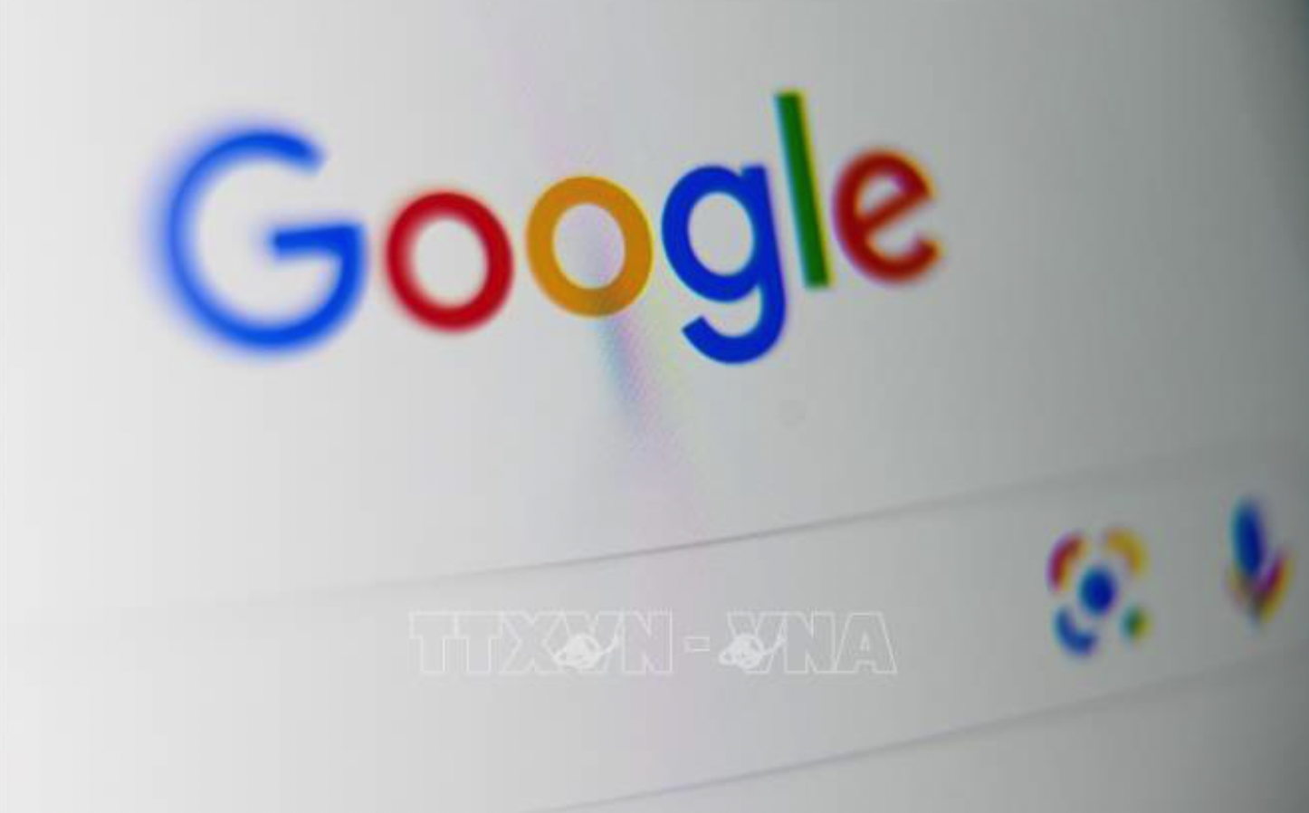 Biểu tượng Google trên màn hình máy tính bảng. Ảnh minh họa: AFP/TTXVN
