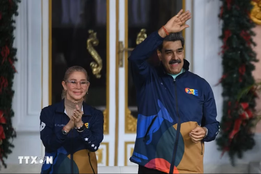 Tổng thống Venezuela Nicolas Maduro và Phu nhân Cilia Flores tại một sự kiện ở Caracas ngày 21/11/2025. (Ảnh: THX/TTXVN)