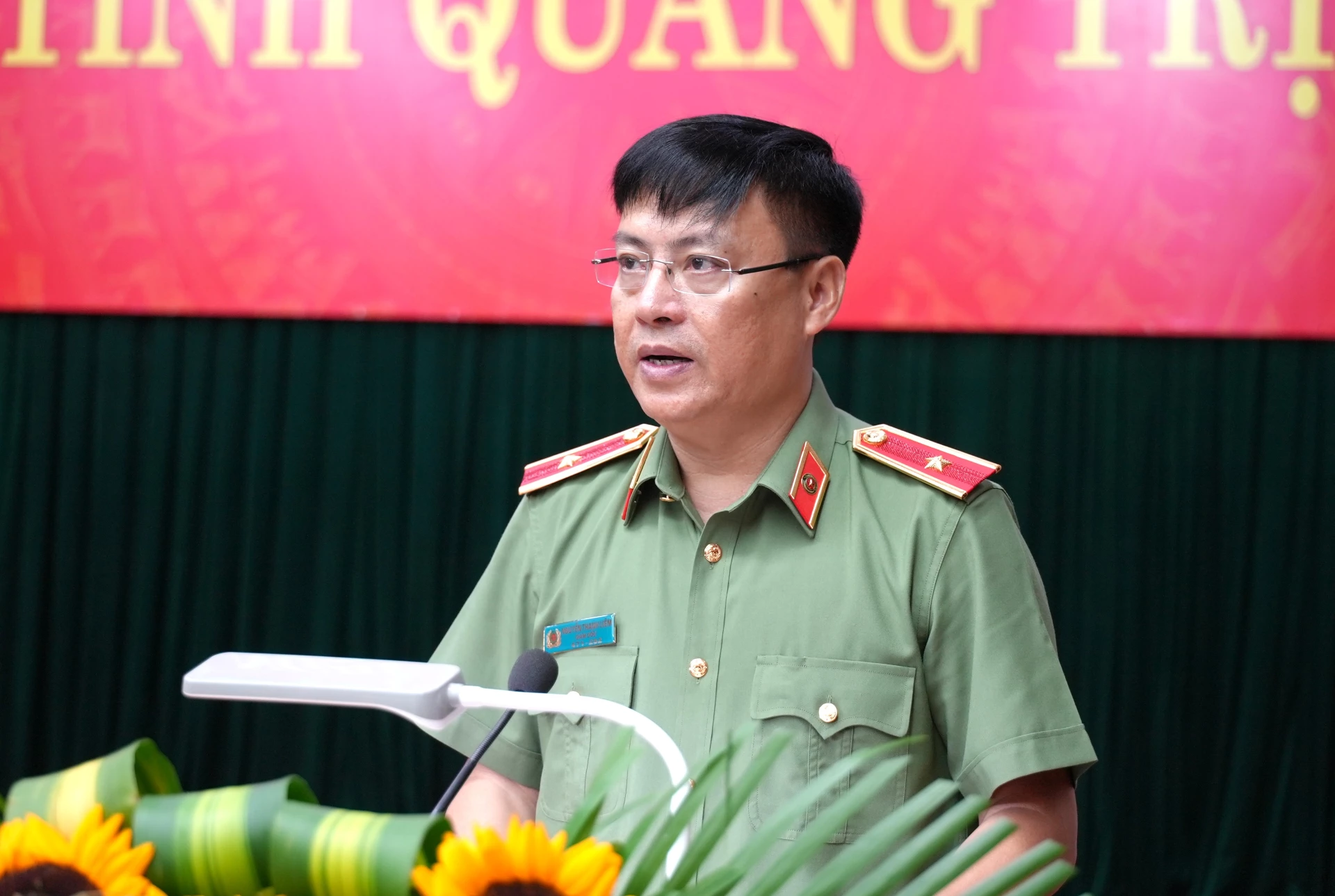 Giám đốc Công an tỉnh, Thiếu tướng Nguyễn Thanh Liêm báo cáo kết quả triển khai thực hiện Đề án 06 - Ảnh: Trung Đức