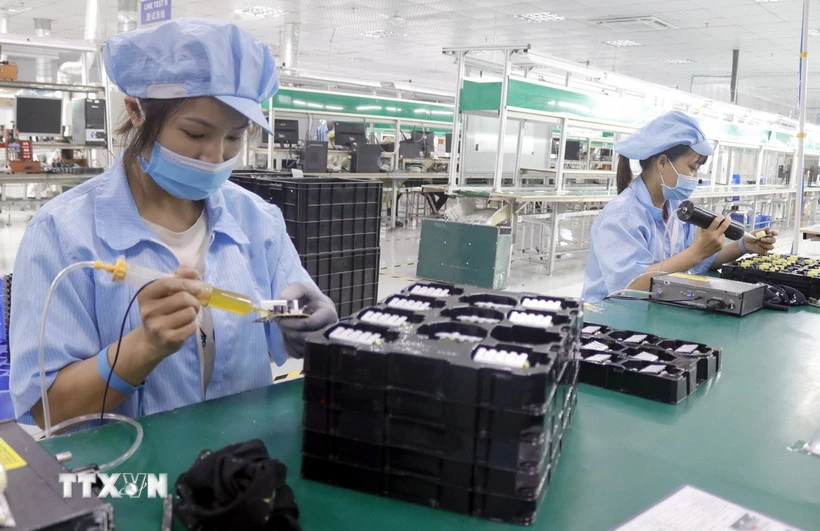 Công nhân tại một doanh nghiệp ở Bắc Giang. (Ảnh: Đồng Thúy/TTXVN)