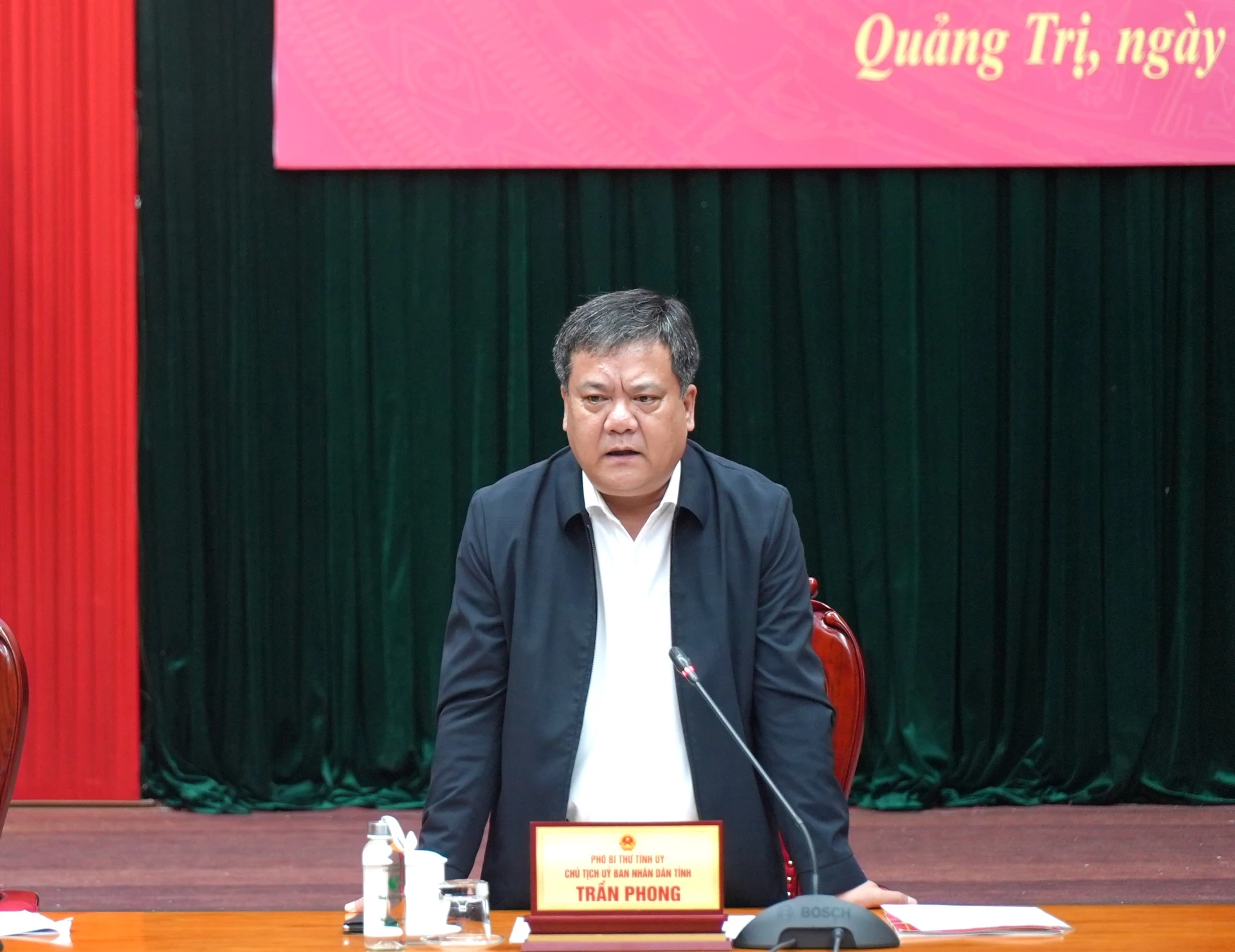 Đồng chí Chủ tịch UBND tỉnh Trần Phong phát biểu kết luận hội nghị - Ảnh: Trung Đức
