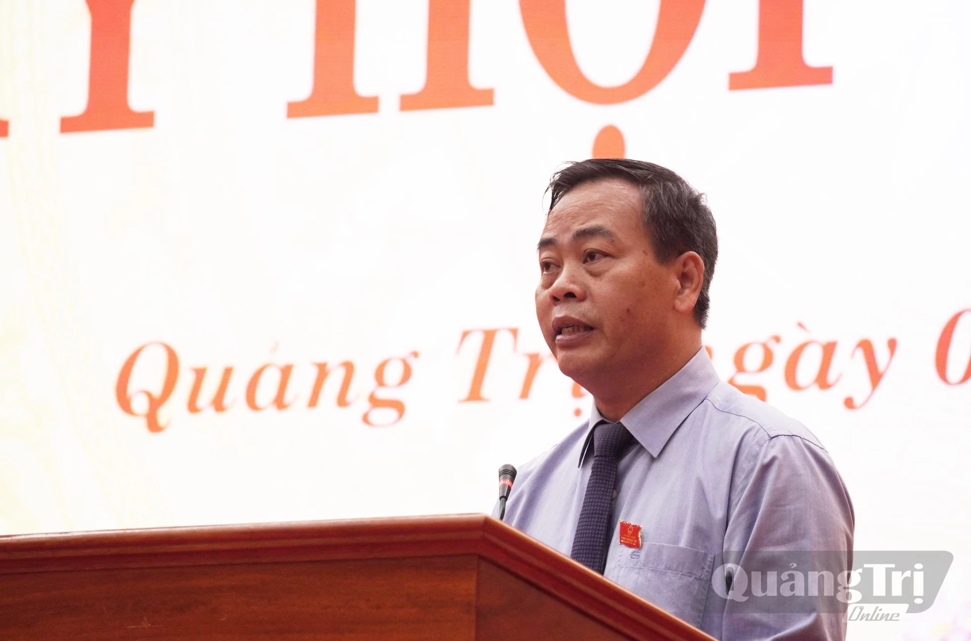 Đồng chí Nguyễn Đăng Quang, Phó Bí thư Tỉnh ủy, Chủ tịch HĐND tỉnh phát biểu khai mạc kỳ họp - Ảnh: X.P