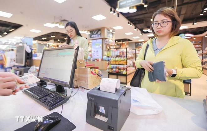 Hóa đơn điện tử khởi tạo từ máy tính tiền. (Ảnh: TTXVN)