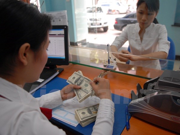 Tỷ giá trung tâm trong ngày 7-1 tăng mạnh lên 21.919 đồng