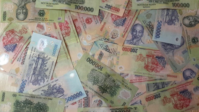 Lượng tiền giả tăng, người dân cầm nắm rõ các đặc điểm bảo mật